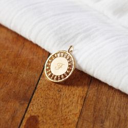 médaille soleil à graver